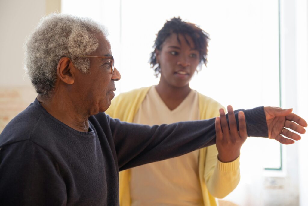 An elderly with a home care physiotherapist
