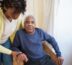 A physio helping a client with stroke rehab