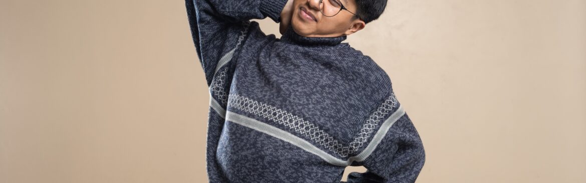 A man with a back and neck pain
