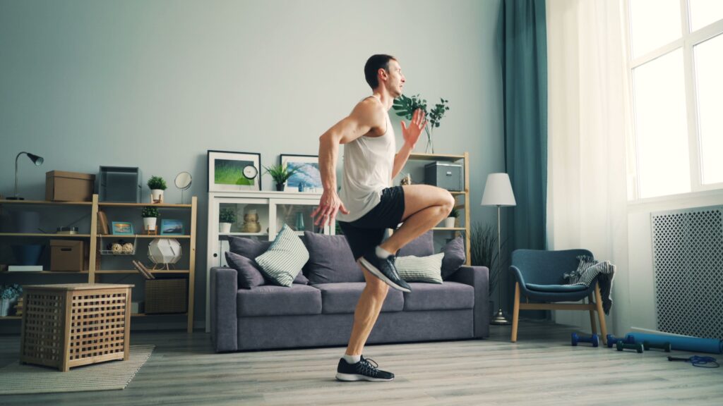 A man exercising indoors